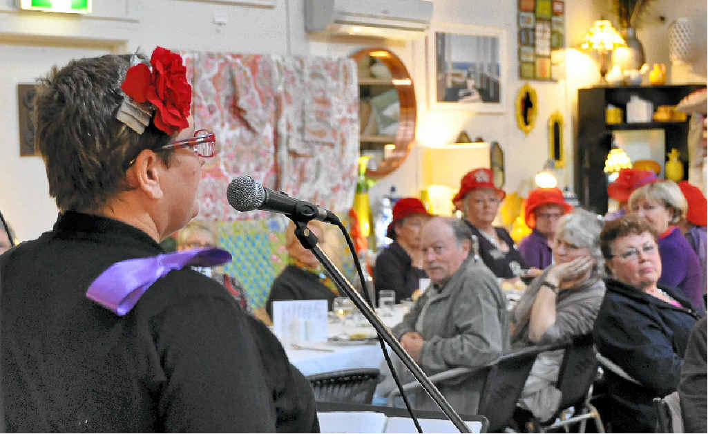 Tara Clarke and other members of the Blue Violets perform for crowds at Bryson’s place.